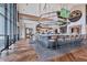 Spacious Barrel House bar, with a tv and a bar countertop with seating; featuring a modern and sleek design at 4750 Tortona Ct, Bradenton, FL 34211
