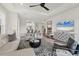 Open-concept living room, view of the kitchen, great for entertaining and comfortable living at 4750 Tortona Ct, Bradenton, FL 34211