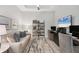 Comfortable office space features modern furnishings, neutral tones, and a dedicated workspace with a great rug at 4750 Tortona Ct, Bradenton, FL 34211