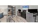 Bright home office offers dual workstations, with comfortable seating and modern decor at 4750 Tortona Ct, Bradenton, FL 34211
