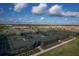 Aerial view of tennis courts and pickleball courts providing abundant outdoor recreational opportunities at 4750 Tortona Ct, Bradenton, FL 34211