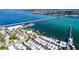 An aerial view of waterfront homes and a bridge over clear blue water at 4802 51St W St # 107, Bradenton, FL 34210
