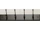 Close up of black coat rack with four hooks at 4802 51St W St # 107, Bradenton, FL 34210