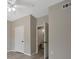 Bedroom with open bathroom door at 4802 51St W St # 107, Bradenton, FL 34210
