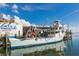 Commercial fishing boat at dock, ready for sea, bait and seafood store in background at 4802 51St W St # 107, Bradenton, FL 34210