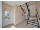 Building exterior featuring stairs, an entryway, and a side door at 4802 51St W St # 107, Bradenton, FL 34210