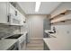 Updated kitchen with new appliances, modern countertops and stainless steel sink at 4802 51St W St # 107, Bradenton, FL 34210