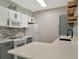 Well-lit kitchen featuring stainless steel appliances and quartz countertops at 4802 51St W St # 107, Bradenton, FL 34210
