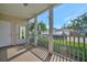 Screened patio featuring a clear view of the parking area and surrounding landscaping at 4802 51St W St # 107, Bradenton, FL 34210