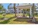 A cozy picnic spot with a table and grill, perfect for outdoor gatherings and relaxation at 4802 51St W St # 107, Bradenton, FL 34210