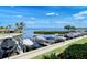Waterfront community dock with boat slips and stunning bay views at 4968 Gulf Of Mexico Dr # Villa 22, Longboat Key, FL 34228