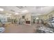 Fitness center featuring treadmills, weight machines, and ample space for a complete workout at 4968 Gulf Of Mexico Dr # Villa 22, Longboat Key, FL 34228