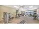 Well-equipped gym with various exercise machines, including treadmills and weightlifting equipment at 4968 Gulf Of Mexico Dr # Villa 22, Longboat Key, FL 34228