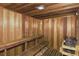 Sauna room with wooden benches, providing a serene and rejuvenating experience at 4968 Gulf Of Mexico Dr # Villa 22, Longboat Key, FL 34228