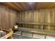 Traditional wooden sauna with benches, creating a warm and inviting space for relaxation at 4968 Gulf Of Mexico Dr # Villa 22, Longboat Key, FL 34228