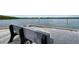 Enjoy waterfront views from the community park bench overlooking calm, peaceful waters at 4968 Gulf Of Mexico Dr # Villa 22, Longboat Key, FL 34228