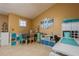 Bedroom featuring neutral walls, tile floors, a workspace with a desk, and a craft area at 5346 Neil Dr, St Petersburg, FL 33714