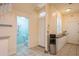 Inviting foyer with ceramic flooring, a half bath, and access to additional living areas at 5346 Neil Dr, St Petersburg, FL 33714