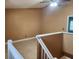 View from a landing featuring neutral paint, tile flooring, and a ceiling fan at 5346 Neil Dr, St Petersburg, FL 33714