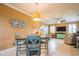 Open-concept living space with dining area and comfortable seating at 5346 Neil Dr, St Petersburg, FL 33714