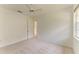 Well-lit bedroom featuring carpet, a fan, and a window at 5533 Ashley Pkwy, Sarasota, FL 34241
