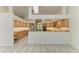 Expansive kitchen with wood cabinets, granite countertops, and stainless steel appliances at 5533 Ashley Pkwy, Sarasota, FL 34241