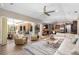 Bright living room with sliding glass doors to lanai offering seamless indoor-outdoor living at 6231 Cypress Bend Ct, University Park, FL 34201