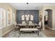 Tastefully designed dining room with modern lighting, elegant decor, and large windows that bring in natural light at 6231 Cypress Bend Ct, University Park, FL 34201
