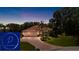 Charming home featuring a three-car garage, tile roof, brick driveway, and well-maintained landscaping and lawn at 6231 Cypress Bend Ct, University Park, FL 34201