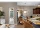 Eat-in kitchen area with counter seating and outdoor patio access, great for entertaining at 6231 Cypress Bend Ct, University Park, FL 34201