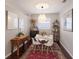 Bright dining room featuring modern decor and a decorative light fixture at 6523 Blue Grosbeak Cir, Lakewood Ranch, FL 34202