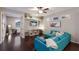 Spacious living room with built-in shelves and modern decor, creating a cozy atmosphere at 6523 Blue Grosbeak Cir, Lakewood Ranch, FL 34202