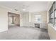 Expansive bedroom with built-in desk, ample natural light and neutral carpeting at 7391 W Country Club N Dr, Sarasota, FL 34243