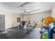 Community gym featuring various exercise machines, weights, and fitness equipment at 7391 W Country Club N Dr, Sarasota, FL 34243