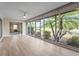 Spacious lanai featuring panoramic views of the lush outdoor scenery, ideal for relaxation and entertainment at 7391 W Country Club N Dr, Sarasota, FL 34243