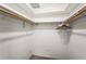 Walk-in closet features a skylight and closet rods for ample storage space at 7391 W Country Club N Dr, Sarasota, FL 34243
