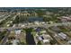 Aerial view showcasing community, lake, major roads and waterfront access of the property's location at 801 E 5Th St, Englewood, FL 34223