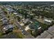 An aerial shot showing a community with waterway access, roads, and the surrounding landscape at 801 E 5Th St, Englewood, FL 34223