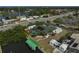 Aerial view showcasing the property's location, RV parking, private boat dock, and nearby lake at 801 E 5Th St, Englewood, FL 34223