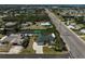A high-angle view of a residential neighborhood with roads, waterways, and the property's location at 801 E 5Th St, Englewood, FL 34223