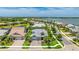 Aerial view highlighting the home's prime location, mature landscaping, and charming curb appeal at 801 Seascape Pl, Sarasota, FL 34240