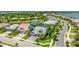 Aerial view showcases the property's landscaped yard and waterfront neighborhood at 801 Seascape Pl, Sarasota, FL 34240
