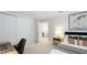 Stylish bedroom with a modern desk, neutral walls, and comfortable bed at 801 Seascape Pl, Sarasota, FL 34240