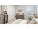 Cozy bedroom with neutral tones, perfect for , featuring playful decor and comfortable furnishings at 801 Seascape Pl, Sarasota, FL 34240