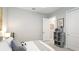 Another view of the cozy bedroom with soft colors and playful decor, well-lit and inviting at 801 Seascape Pl, Sarasota, FL 34240