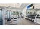 Spacious gym with weight machines, treadmills, and scenic outdoor views at 801 Seascape Pl, Sarasota, FL 34240