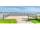 Community observation deck overlooking a serene lake with seating and decorative railing at 801 Seascape Pl, Sarasota, FL 34240