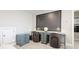 Study area featuring modern desks, chairs, and a large periodic table art piece at 801 Seascape Pl, Sarasota, FL 34240
