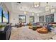 Game room with a sofa, foosball table, and colorful decor, perfect for entertainment at 8612 Evening Dr, Sarasota, FL 34241