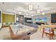 Spacious game room with air hockey, seating, televisions, and fun, engaging decor at 8612 Evening Dr, Sarasota, FL 34241